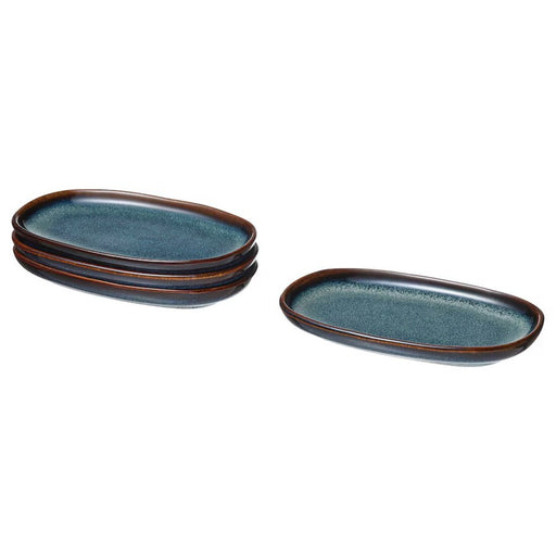 IKEA GLADELIG Stoneware Plate - Full View: Ocean blue stoneware plate with golden-brown details, showcasing its reactive glaze finish and handcrafted look.