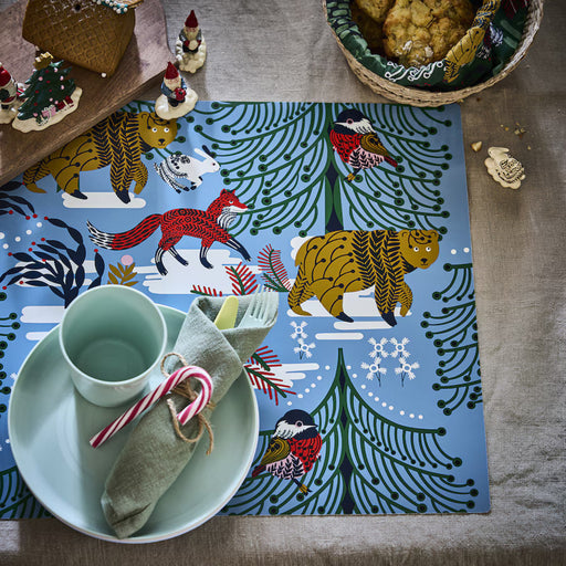 A dining table set with the IKEA VINTERFINT blue animal pattern placemat-60581171