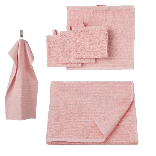 A pink bath towel from the Ikea 6 Piece Combo Set, folded neatly on a white towel rack.