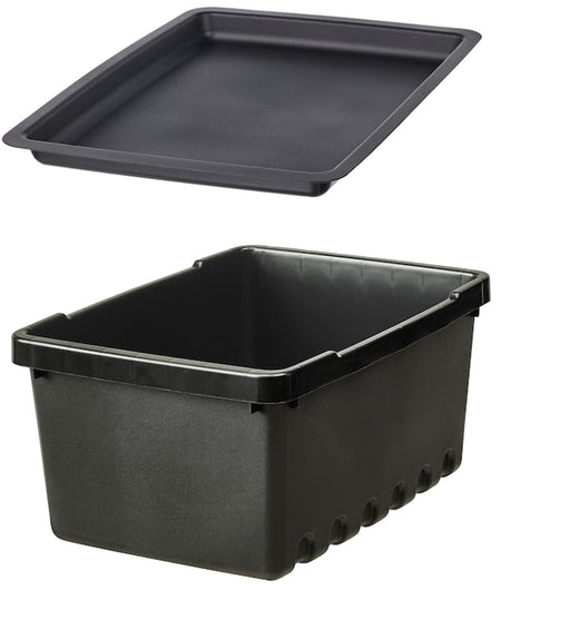 An IKEA storage box with a snap-on lid for home organization and neat storage.