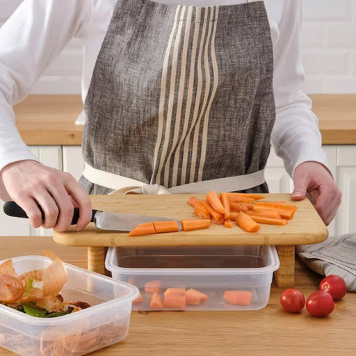 An IKEA cutting board set consisting of three boards in different sizes and colors, made of flexible and easy-to-clean material, perfect for organizing your kitchen.